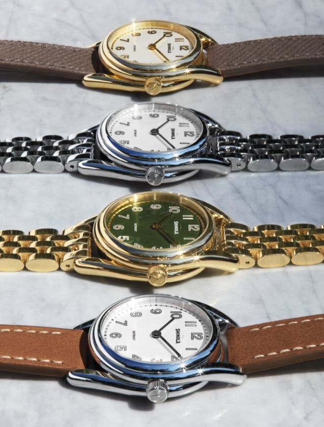 An image of four Derby watches in different colors and styles next to a model smiling wearing the Derby watch