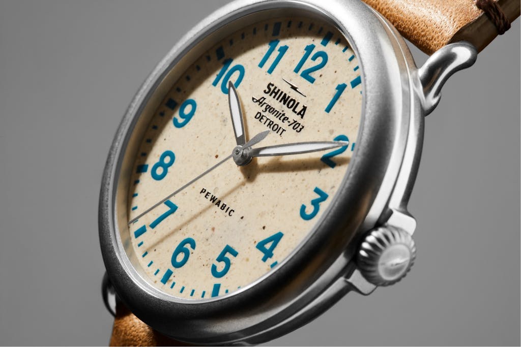 Detail shot showing the clay dial on a Shinola X Pewabic Runwell Detail shot showing the clay dial on a Shinola X Pewabic Runwell 