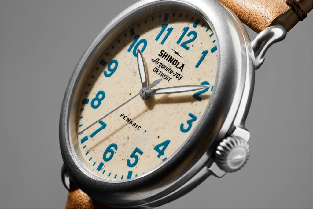 Detail shot showing the clay dial on a Shinola X Pewabic Runwell Detail shot showing the clay dial on a Shinola X Pewabic Runwell